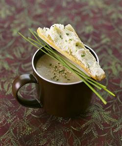 Mushroom soup with gomasio (sesame salt) & soft cheese on bread