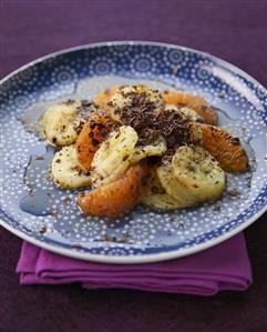 Baked banana with grapefruit and grated chocolate