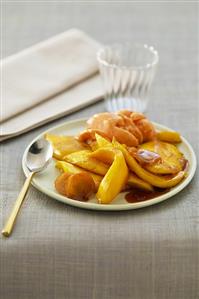 Fried mango with rum and orange ice cream