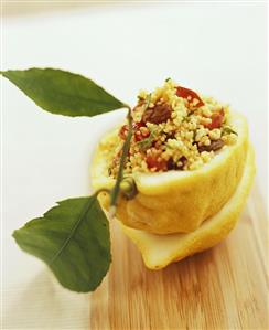 Half a lemon stuffed with couscous