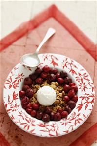 Cherry crumble with a scoop of ice cream