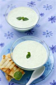 Cold cucumber soup with mint leaves