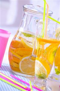 Lemonade with slices of orange and lemon