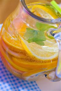 Lemonade with slices of orange and lemon