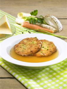 Tyrolean Kaspressknödel (fried cheese dumplings) in beef broth