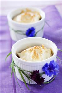 Fruit with meringue topping in ramekins