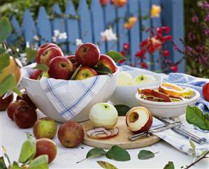 Apples in a bowl and peeled apples