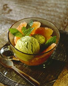 Lime and mint ice cream with grapefruit and mint leaves