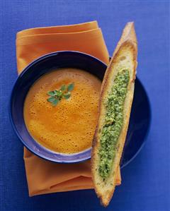 Red pepper cream soup with pesto bruschetta