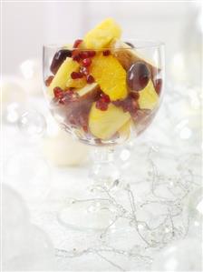 Fruit salad with pomegranate seeds for Christmas