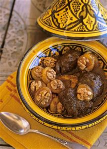 Veal tajine with dried apricots and walnuts