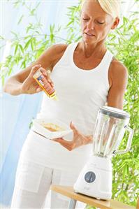 Woman preparing apricot mask