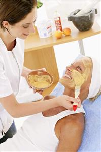 Applying a fresh fruit face mask