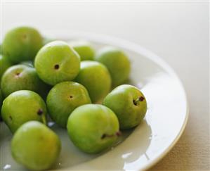 Greengages on a plate