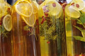 Herb grappa in several bottles (detail)