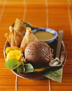 Chocolate ice cream with samosas and fruit