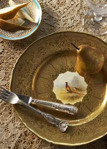 Autumnal place-setting with pear