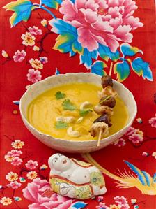 Cream of pumpkin soup with chicken skewer