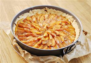 Peach tart in the baking tin