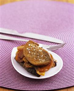 Fried goose liver with apple on toasted bread