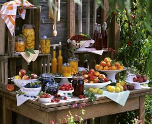 Still life with fresh and bottled fruit