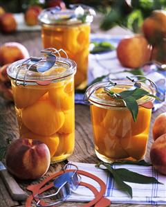 Bottled and fresh peaches