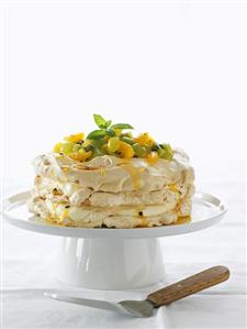 Layered meringue gateau with fruit