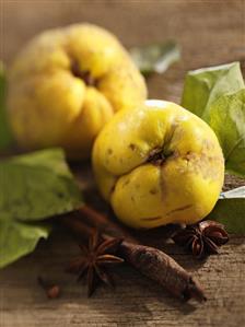 Still life with quinces, cinnamon stick, star anise, cloves