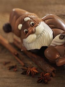 Broken chocolate Father Christmas, cinnamon, cloves, star anise