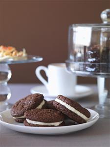 Cream-filled chocolate biscuits