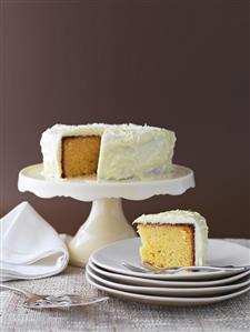 Lemon cake with a piece removed