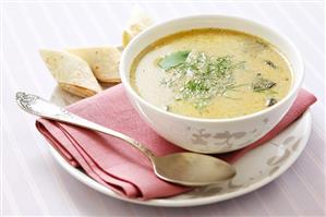 Creamy mushroom soup with dill and pancake rolls