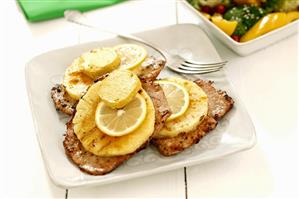 Pork escalopes with pineapple, lemon and butter