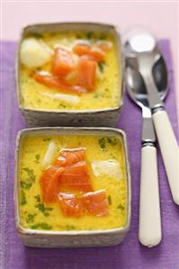 Potato soup with smoked salmon and parsley