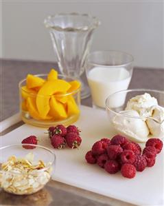 Ingredients for Peach Melba (Peaches, raspberries, ice cream)