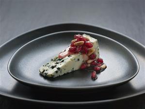 Blue cheese with pomegranate chutney and pine nuts