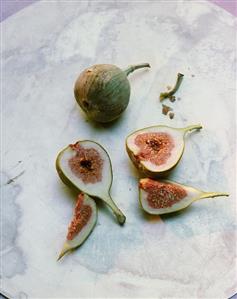 Fresh figs, one cut into pieces