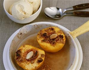 Baked peaches with vanilla ice cream