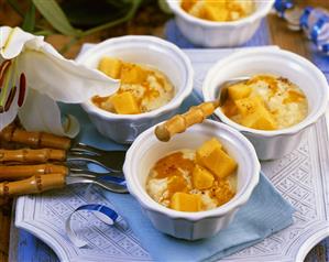 Coconut rice pudding with mango sauce