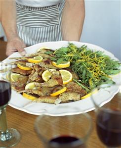 Lamb chops with rocket and lemon