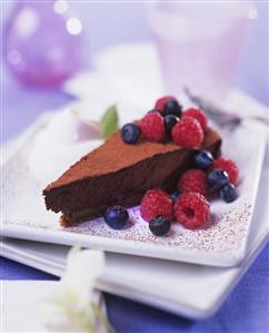 Chocolate truffle cake with fresh berries