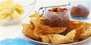 Tomato and pineapple chutney and toasted poppadoms (India)