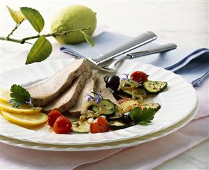 Steamed loin of veal with vegetables and lemon