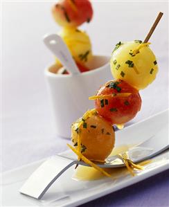 Marinated melon skewers