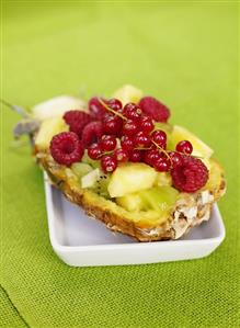 Fruit salad with pineapple, kiwi fruit and berries