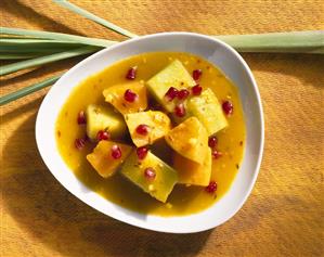 Melon curry with pomegranate seeds