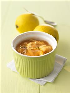 Lemon marmalade with lemon balm in green ramekin