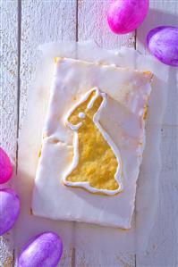 Iced orange cake with Easter Bunny biscuit