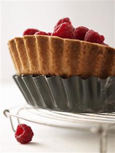 Raspberry tart in the baking tin