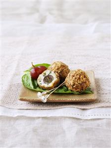 Blue cheese balls with grapes and chopped pecans